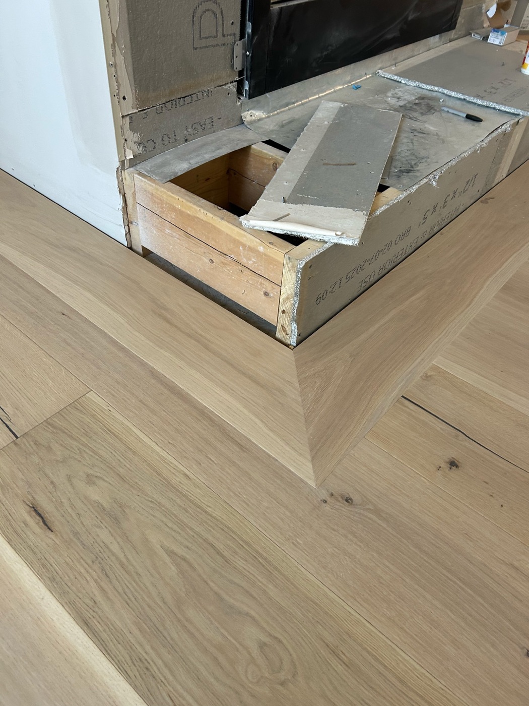 Close hardwood flooring edge detail showing precise craftsmanship